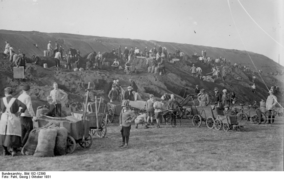 Families of Unemployed Miners in the Ruhr Valley Search for Winter Fuel in the Remains of a Slagheap  (1931)